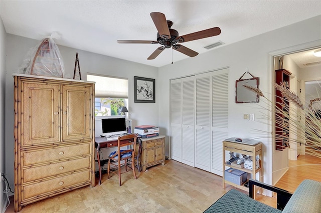 519 Bayview Ave, Osprey, FL 34229 - office area featuring light wood-type flooring and a ceiling fan