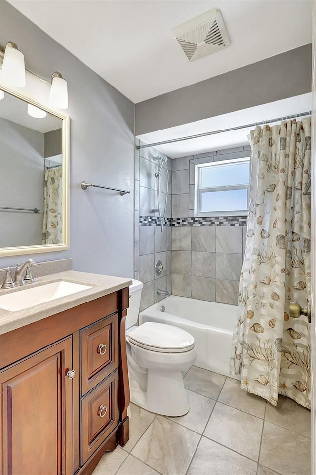 519 Bayview Ave, Osprey, FL 34229 - full bathroom with toilet, vanity, shower / bathtub combination with curtain, and tile patterned floors