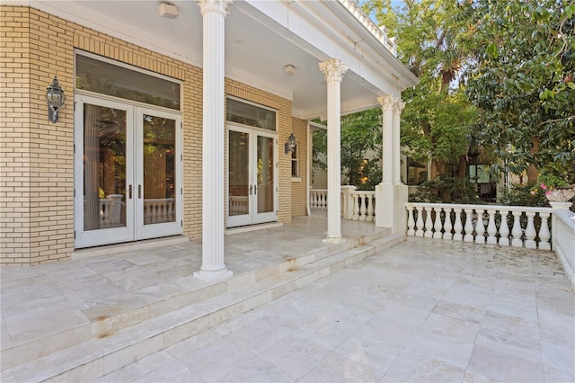 view of patio featuring french doors