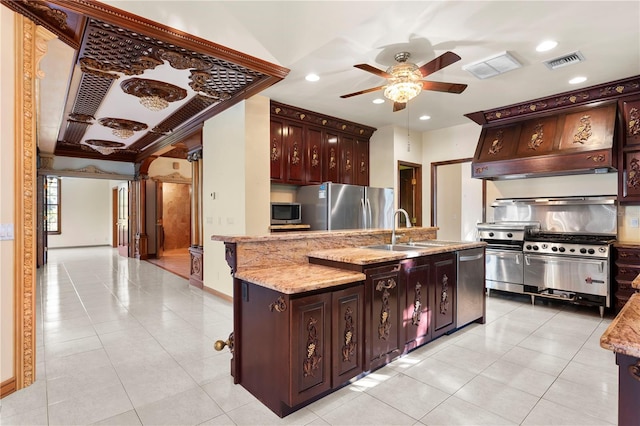 kitchen with a sink, appliances with stainless steel finishes, visible vents, ceiling fan, and light tile patterned flooring