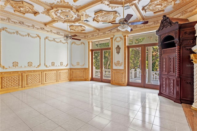 unfurnished room with light tile patterned floors, a ceiling fan, coffered ceiling, and french doors