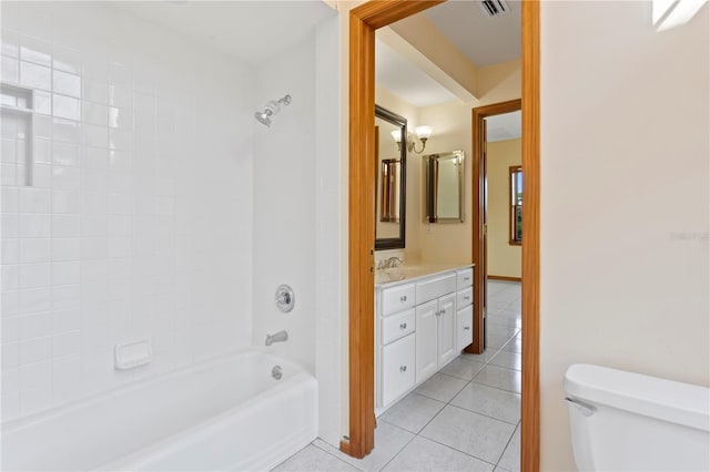 full bath with tile patterned floors, toilet, vanity, visible vents, and tub / shower combination