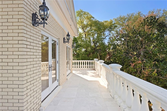 balcony featuring french doors