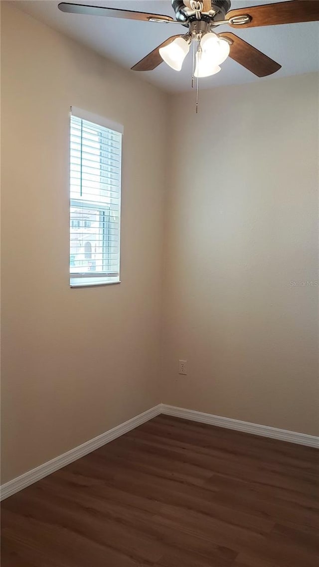215 63rd Dr E, Bradenton, FL 34203 - spare room featuring wood finished floors, ceiling fan, and baseboards