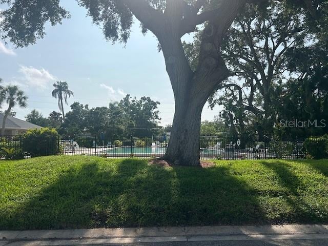 7461 W Country Club Dr N Unit 201, Sarasota, FL 34243 - surrounding community with a pool