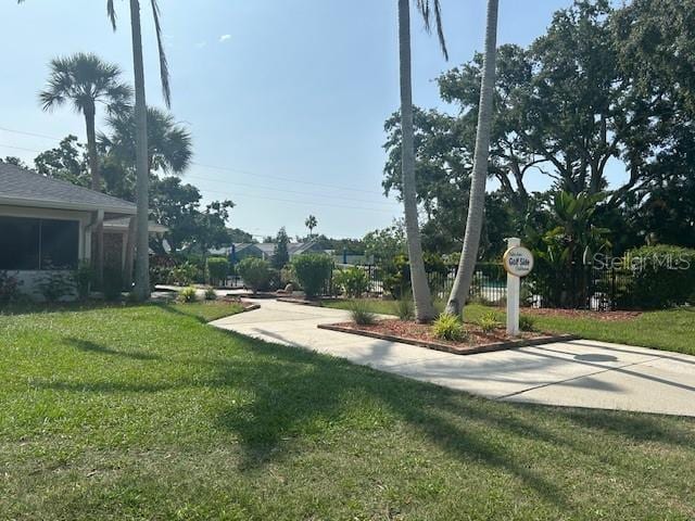 7461 W Country Club Dr N Unit 201, Sarasota, FL 34243 - view of green lawn
