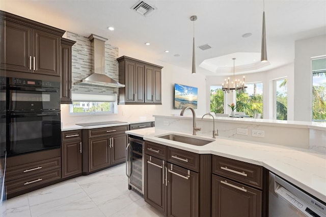 7118 Hawks Harbor Cir, Bradenton, FL 34207 - kitchen featuring visible vents, a sink, black appliances, beverage cooler, and wall chimney exhaust hood