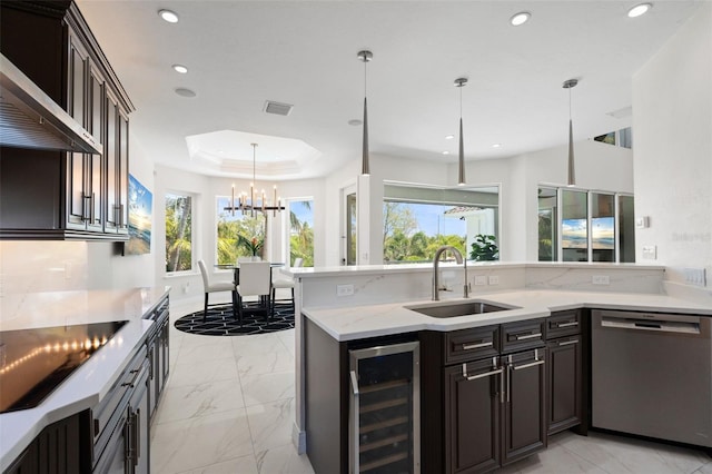 7118 Hawks Harbor Cir, Bradenton, FL 34207 - kitchen featuring visible vents, wine cooler, wall chimney exhaust hood, a sink, and dishwasher