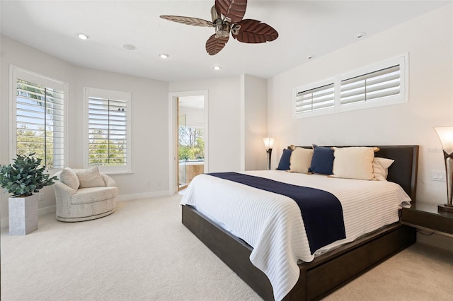 7118 Hawks Harbor Cir, Bradenton, FL 34207 - carpeted bedroom featuring recessed lighting, ceiling fan, multiple windows, and baseboards