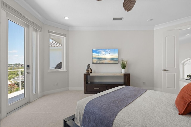 7118 Hawks Harbor Cir, Bradenton, FL 34207 - bedroom with ornamental molding, access to exterior, carpet flooring, and visible vents