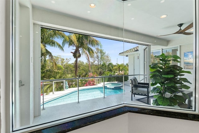 7118 Hawks Harbor Cir, Bradenton, FL 34207 - view of swimming pool featuring a pool with connected hot tub and a ceiling fan