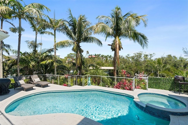 7118 Hawks Harbor Cir, Bradenton, FL 34207 - view of pool featuring a pool with connected hot tub and a patio area