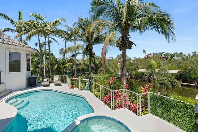 7118 Hawks Harbor Cir, Bradenton, FL 34207 - view of pool with a water view and a pool with connected hot tub