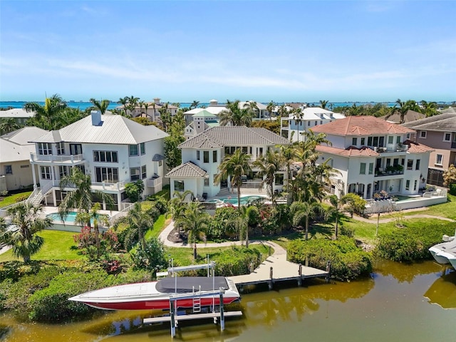 7118 Hawks Harbor Cir, Bradenton, FL 34207 - birds eye view of property with a water view and a residential view