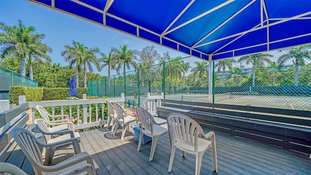 5920 Midnight Pass Rd Unit 406, Sarasota, FL 34242 - wooden terrace featuring a tennis court