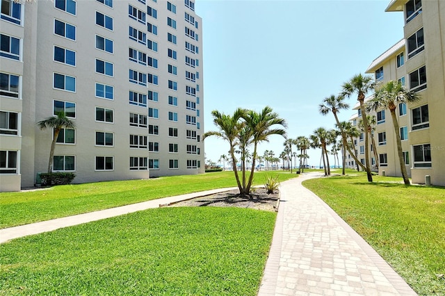 5920 Midnight Pass Rd Unit 406, Sarasota, FL 34242 - view of property's community featuring a lawn