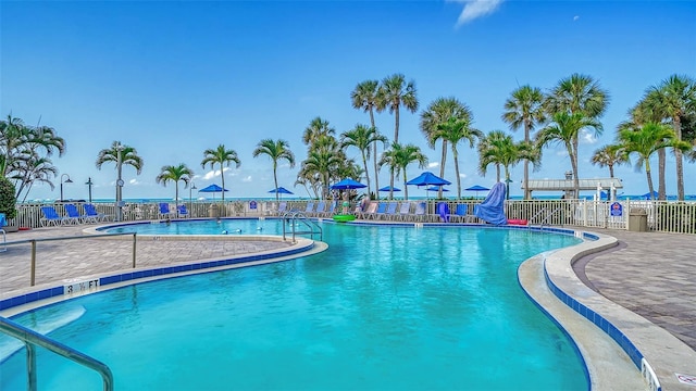 5920 Midnight Pass Rd Unit 406, Sarasota, FL 34242 - community pool featuring a patio area
