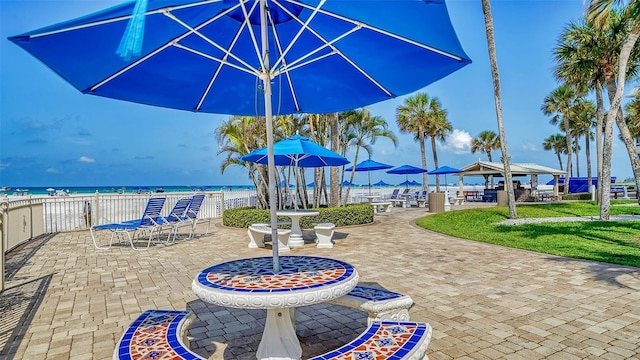 5920 Midnight Pass Rd Unit 406, Sarasota, FL 34242 - view of patio / terrace with a gazebo and a water view