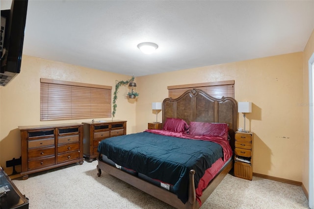bedroom featuring baseboards