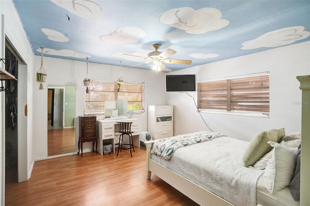bedroom with wood finished floors