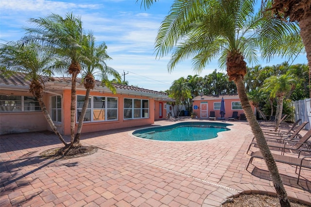 view of pool featuring fence, a patio area, and a fenced in pool