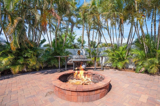 view of patio / terrace featuring fence