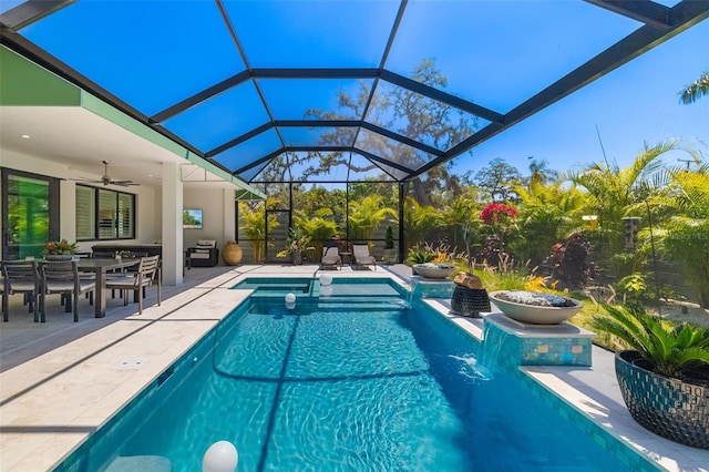 view of swimming pool featuring glass enclosure, a fenced in pool, a ceiling fan, a patio area, and outdoor dining space
