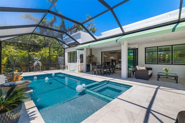 view of swimming pool with a pool with connected hot tub, a patio area, glass enclosure, and outdoor dining space