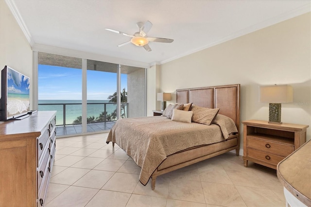 bedroom with ornamental molding, floor to ceiling windows, light tile patterned floors, and access to exterior