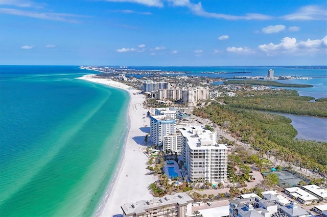 bird's eye view featuring a view of city, a view of the beach, and a water view