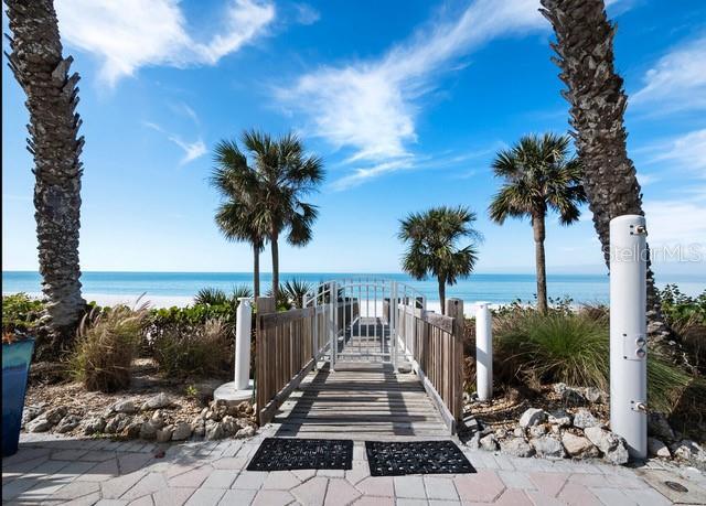surrounding community with a water view