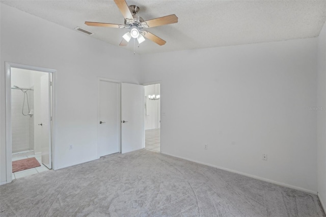 5382 Royal Palm Ave Unit 5382, Sarasota, FL 34234 - unfurnished bedroom with carpet floors, a chandelier, connected bathroom, a ceiling fan, and baseboards