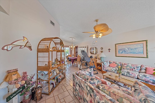 4053 Lancaster Dr, Sarasota, FL 34241 - living room featuring a textured ceiling, visible vents, and ceiling fan with notable chandelier