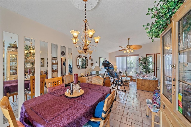 4053 Lancaster Dr, Sarasota, FL 34241 - dining space featuring vaulted ceiling, a textured ceiling, brick floor, and ceiling fan with notable chandelier