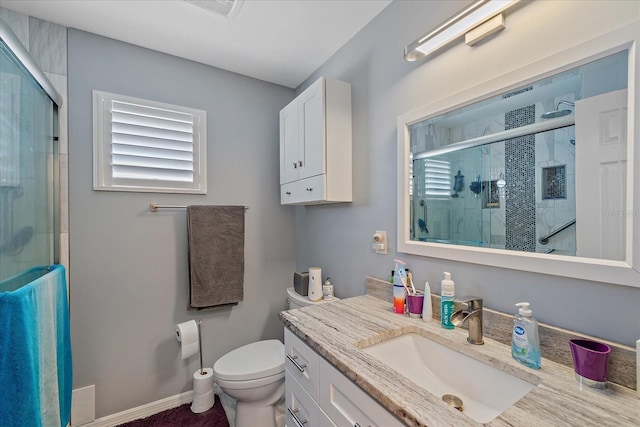 4053 Lancaster Dr, Sarasota, FL 34241 - full bathroom featuring plenty of natural light, toilet, vanity, and a stall shower