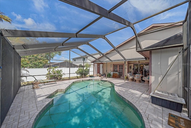 4053 Lancaster Dr, Sarasota, FL 34241 - view of swimming pool featuring french doors, a fenced in pool, a lanai, fence, and a patio