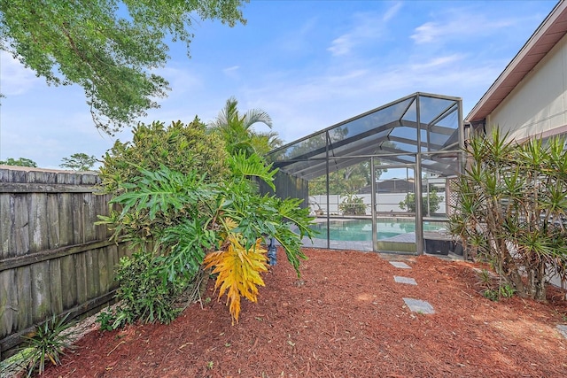 4053 Lancaster Dr, Sarasota, FL 34241 - view of yard with fence and a fenced in pool