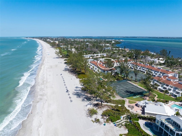 aerial view featuring a view of the beach and a water view