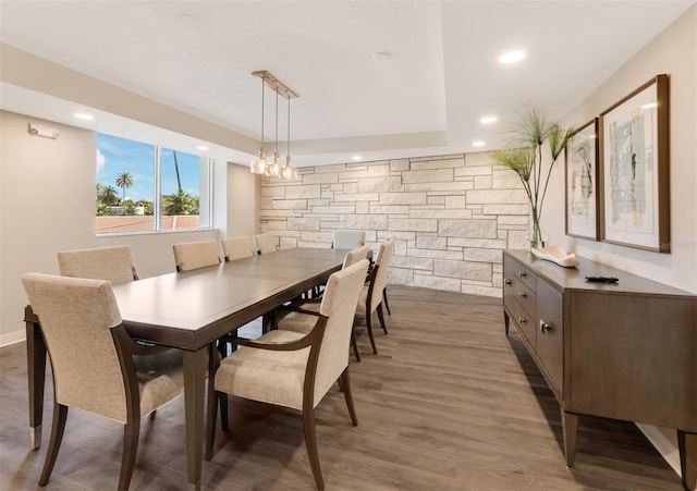 dining room featuring light wood finished floors and recessed lighting