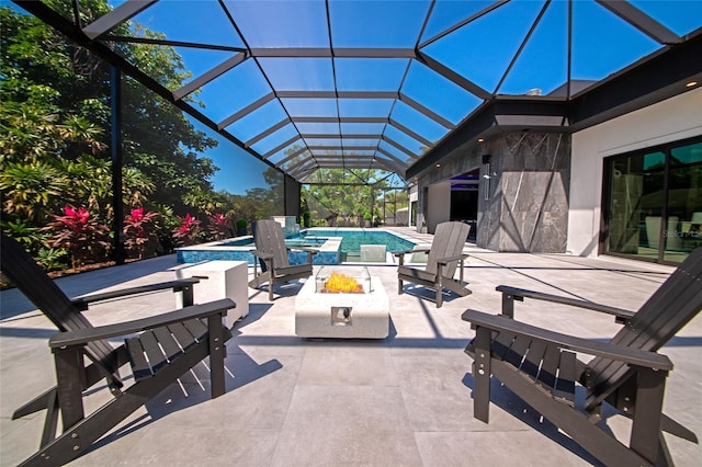 view of patio with a fire pit, glass enclosure, and an outdoor pool