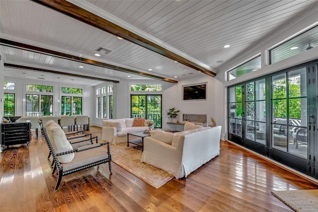 103 Park Ave, Anna Maria, FL 34216 - living room with wood ceiling, beam ceiling, wood finished floors, and visible vents