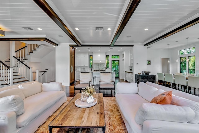 103 Park Ave, Anna Maria, FL 34216 - living area with stairway, light wood-style floors, beamed ceiling, visible vents, and recessed lighting