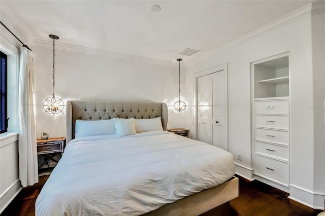 103 Park Ave, Anna Maria, FL 34216 - bedroom with dark wood finished floors, baseboards, and ornamental molding