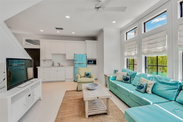 103 Park Ave, Anna Maria, FL 34216 - living area featuring recessed lighting, visible vents, crown molding, and ceiling fan
