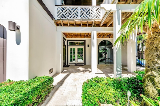 103 Park Ave, Anna Maria, FL 34216 - entrance to property with stucco siding and french doors