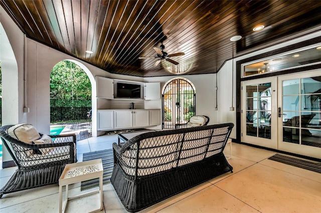 103 Park Ave, Anna Maria, FL 34216 - view of patio / terrace featuring an outdoor living space, a ceiling fan, and french doors