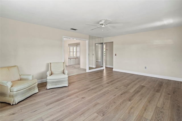 214 49th St W, Bradenton, FL 34209 - sitting room featuring visible vents, light wood finished floors, baseboards, and ceiling fan
