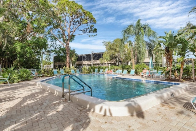 pool with a patio area