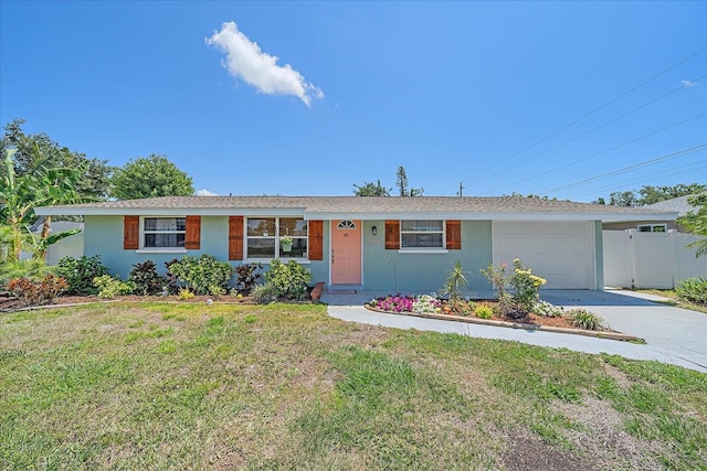 130 E Seminole Dr, Venice, FL 34293 - single story home featuring stucco siding, fence, a front lawn, a garage, and driveway