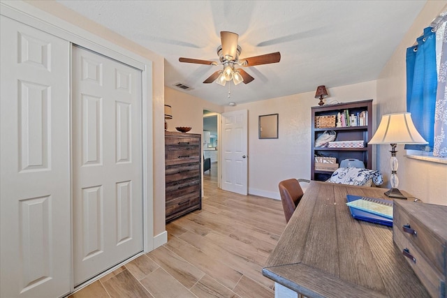 130 E Seminole Dr, Venice, FL 34293 - office with light wood-type flooring, visible vents, baseboards, and a ceiling fan